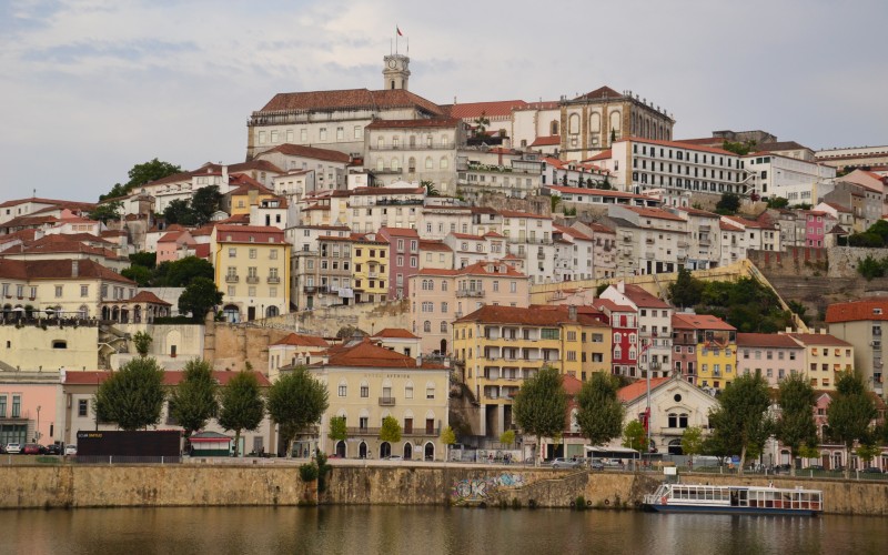 a city with many buildings and a body of water