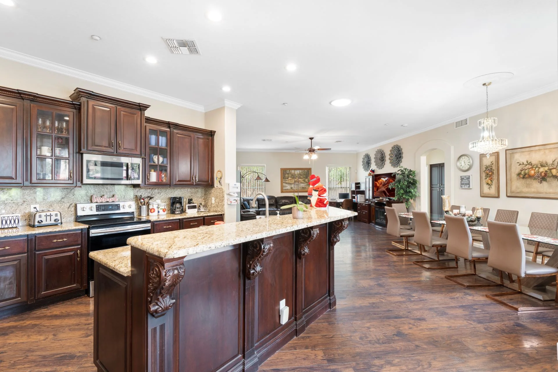 a kitchen and dining area with a large island