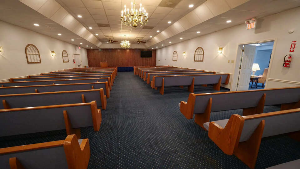 a church pews in a room