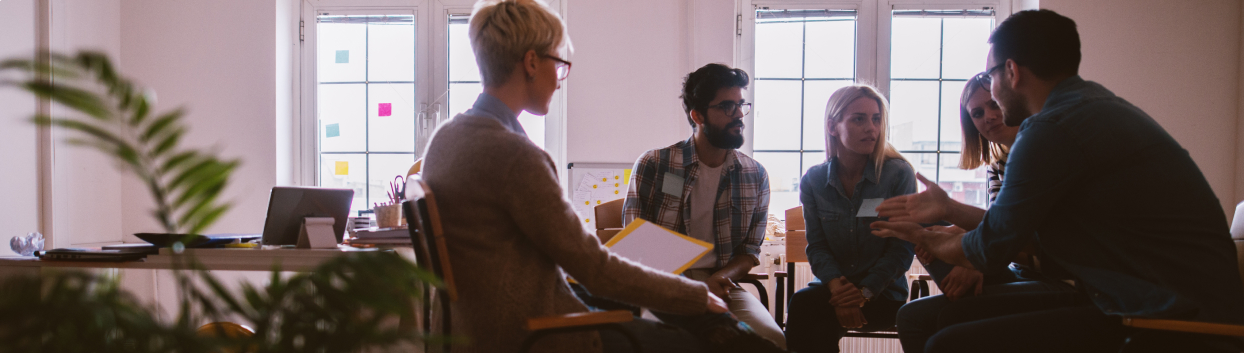 a man and woman sitting in a room