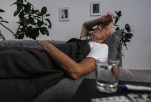 a man lying on a couch