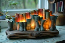 a candle holder with candles lit