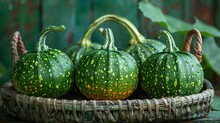 a group of green pumpkins in a basket