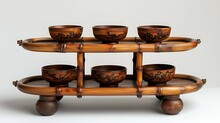 a wooden shelf with bowls on it