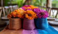 a group of flowers in a pot