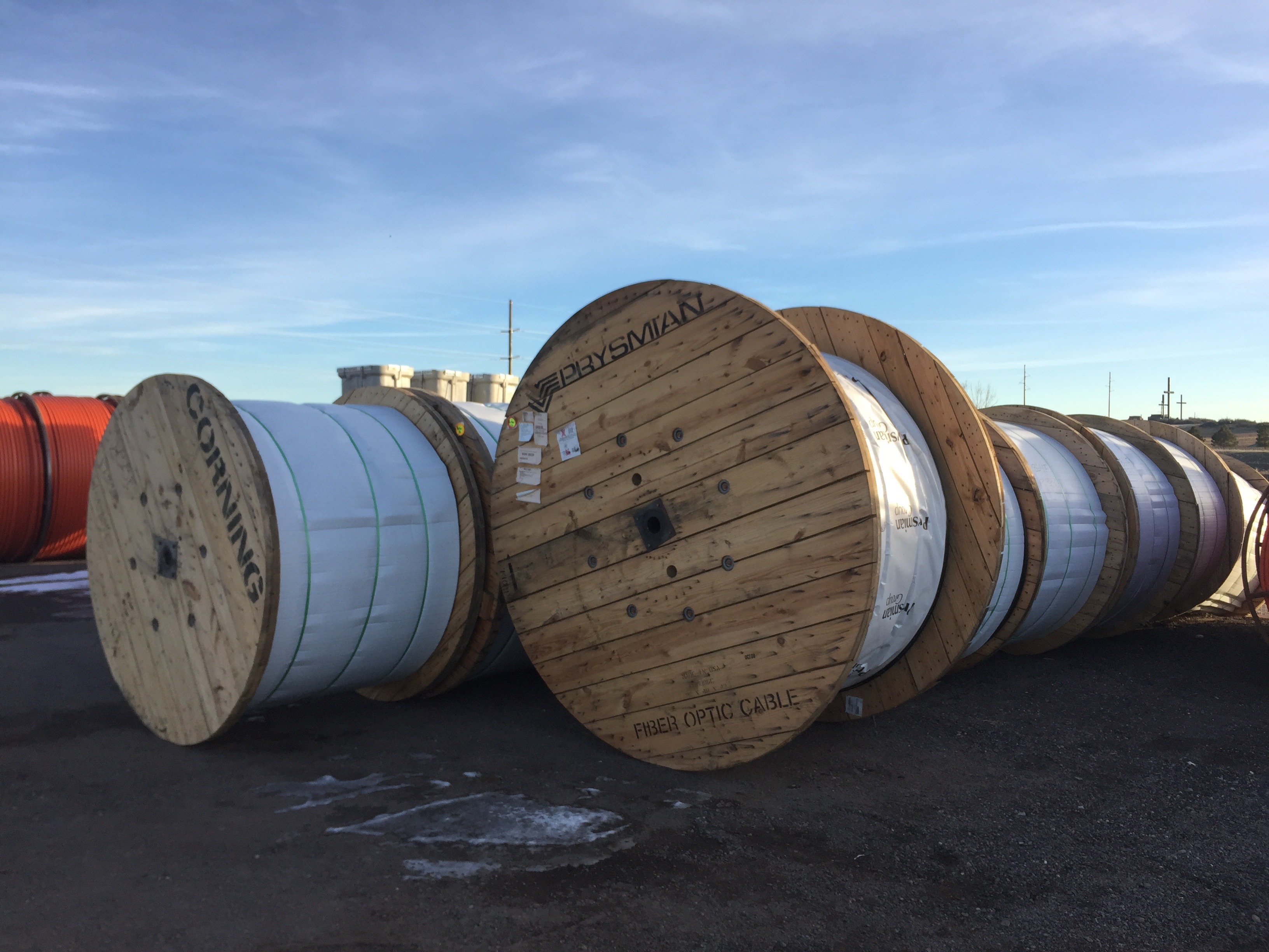 a group of large wooden coils