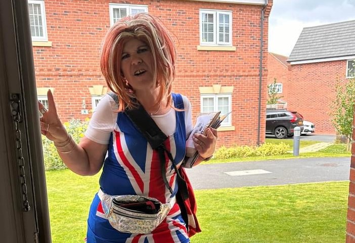 a woman in a flag dress