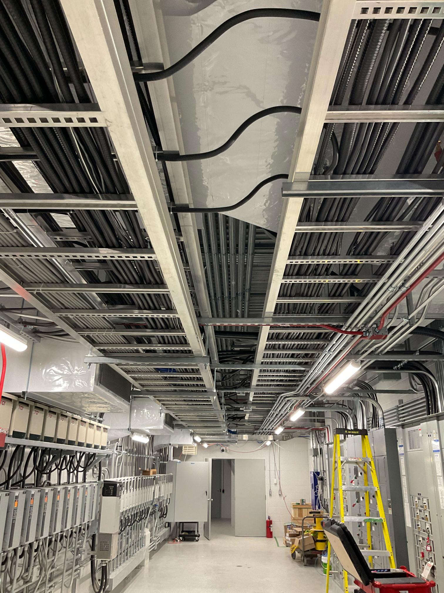 a ceiling with wires and cables