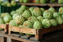 a wooden crate full of green fruit