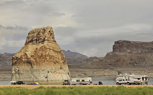 a group of rvs parked near a body of water