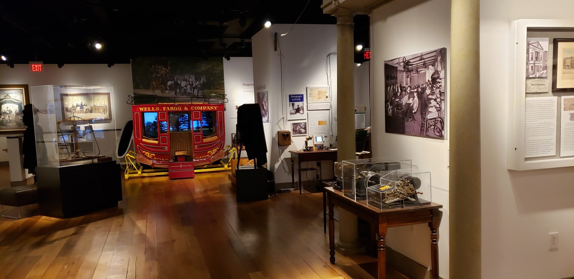 a room with a red trolley and a wood floor