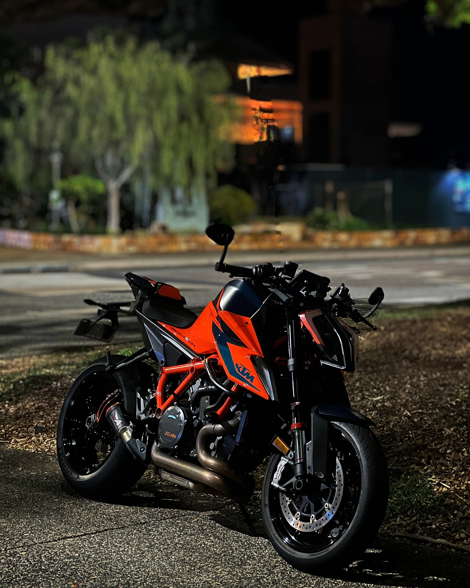 a motorcycle parked on the side of a road