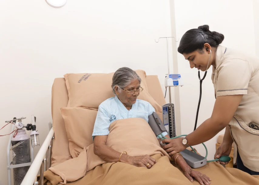 a woman in a hospital bed