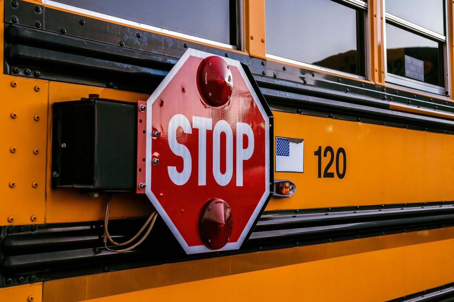 a stop sign on a school bus