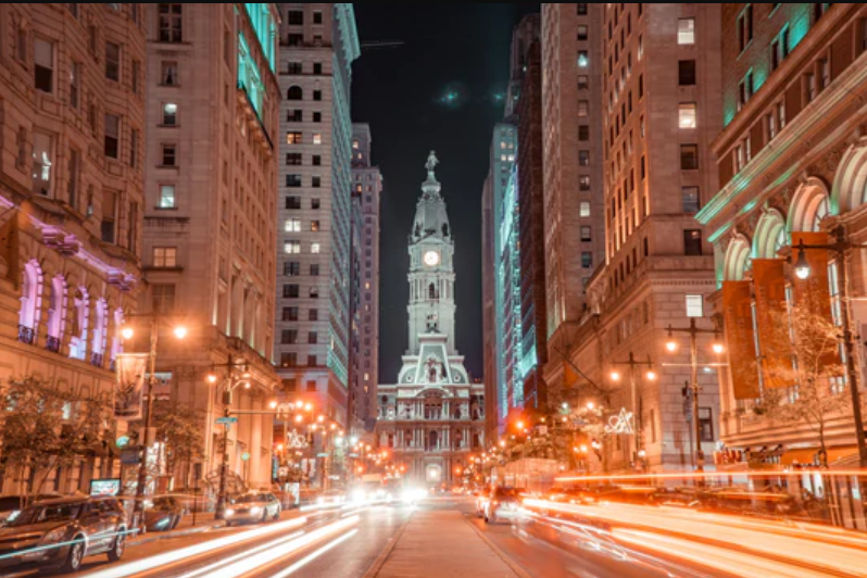 a city street with a clock tower