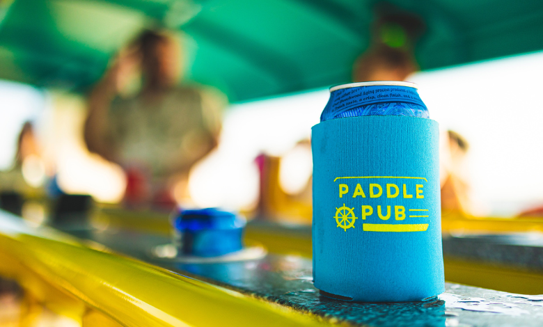 a can of beer on a yellow and blue surface