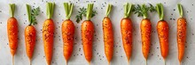 a row of carrots with green stems