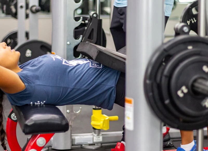 a man doing a bench press