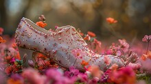 a white shoe surrounded by flowers