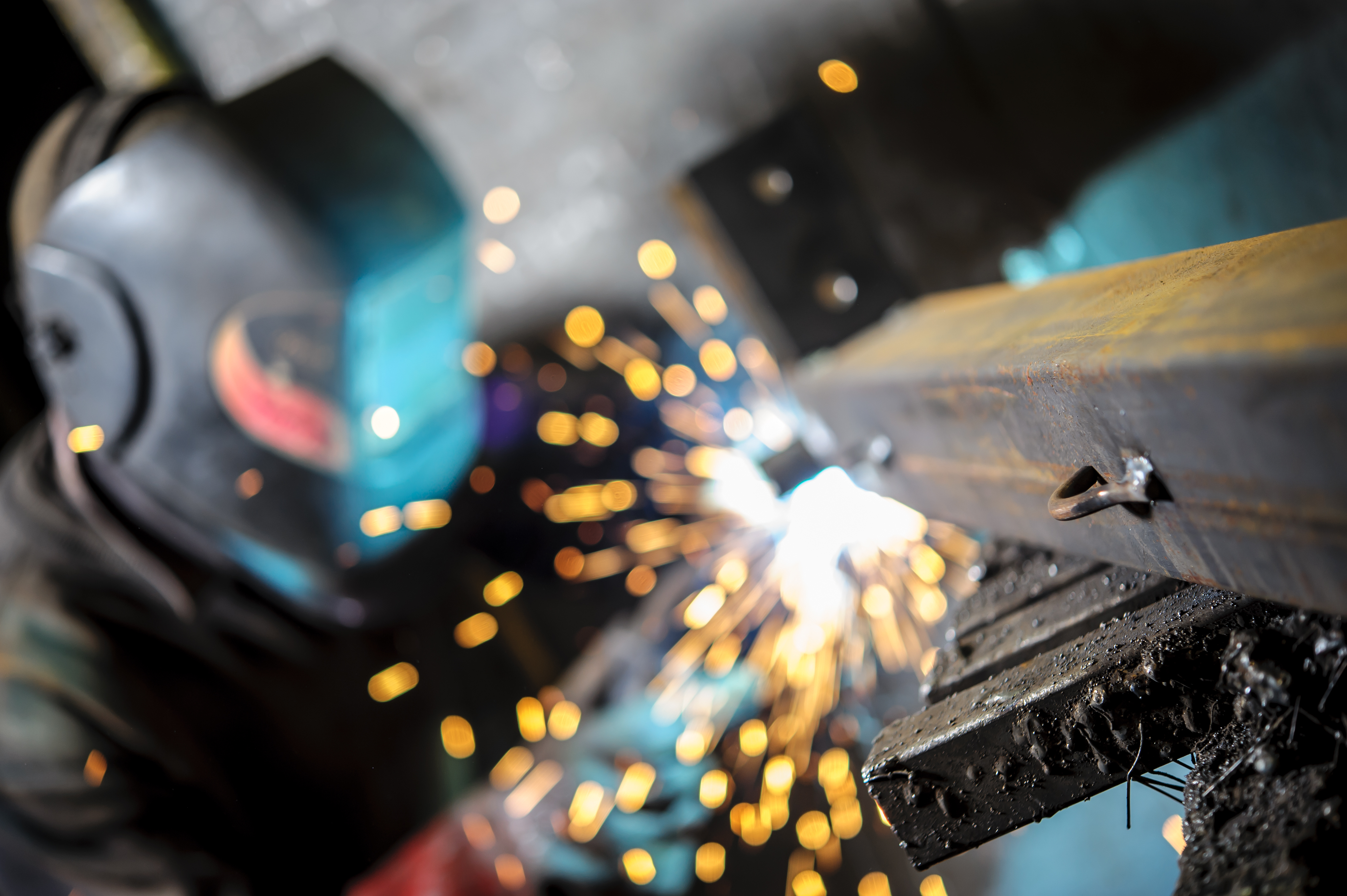 sparks flying from a metal bar