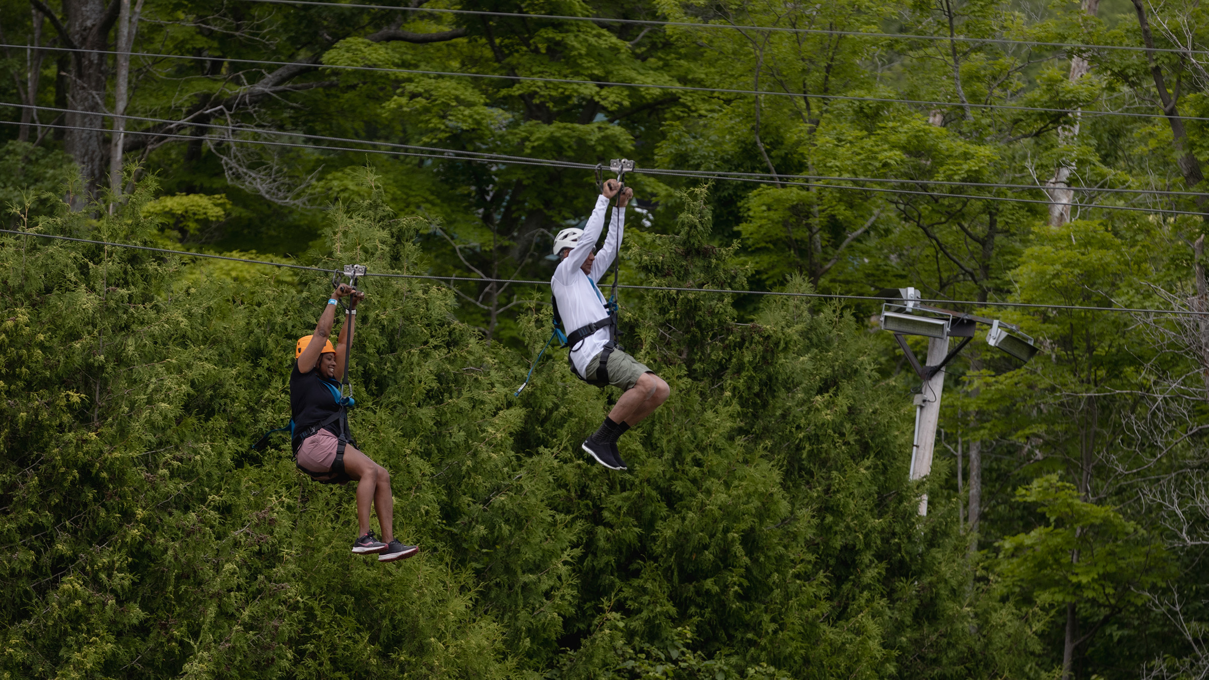 people on a zip line