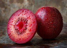 a cut fruit with water drops