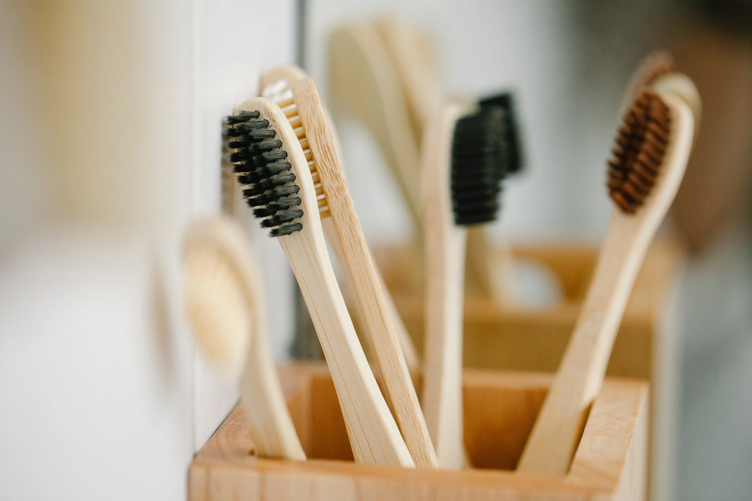 a group of toothbrushes in a holder