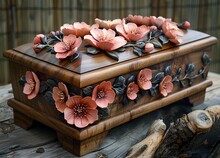 a casket with flowers on it