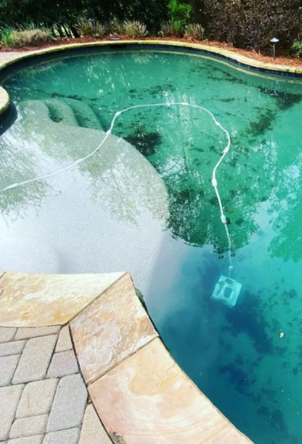 a pool with a pool cleaner