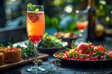 a glass of drink and food on a table