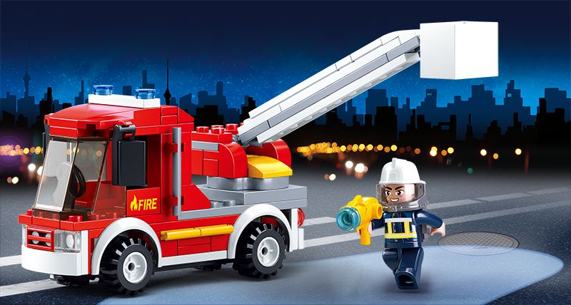 a toy fire truck with a fireman