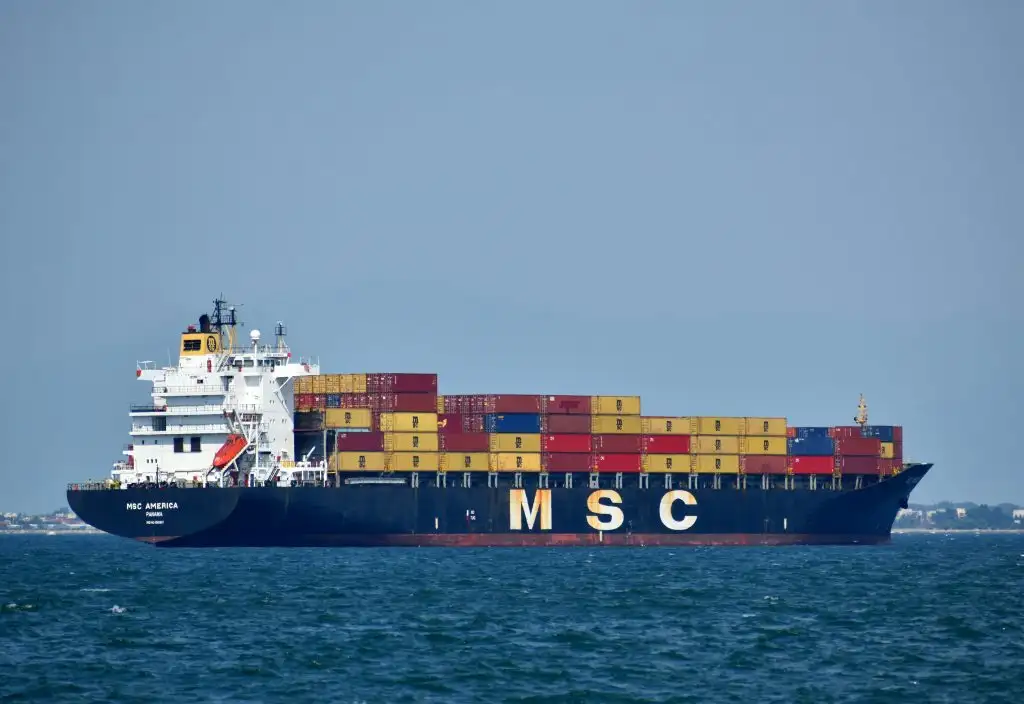 a large ship with containers on it
