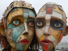 two people with masks on