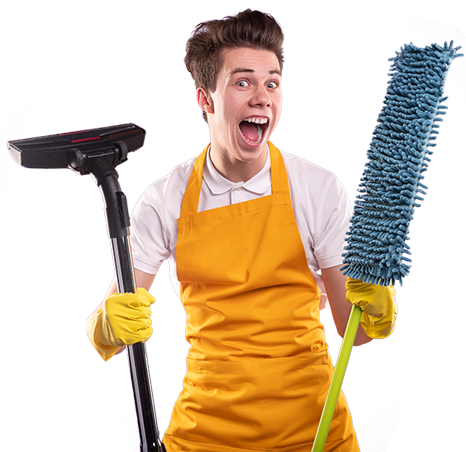 a man holding a mop and a broom