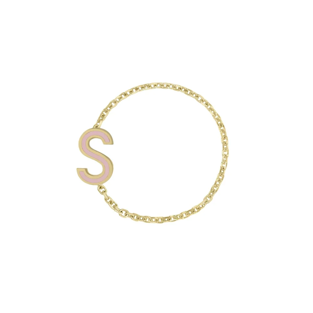 a gold chain with a letter on it