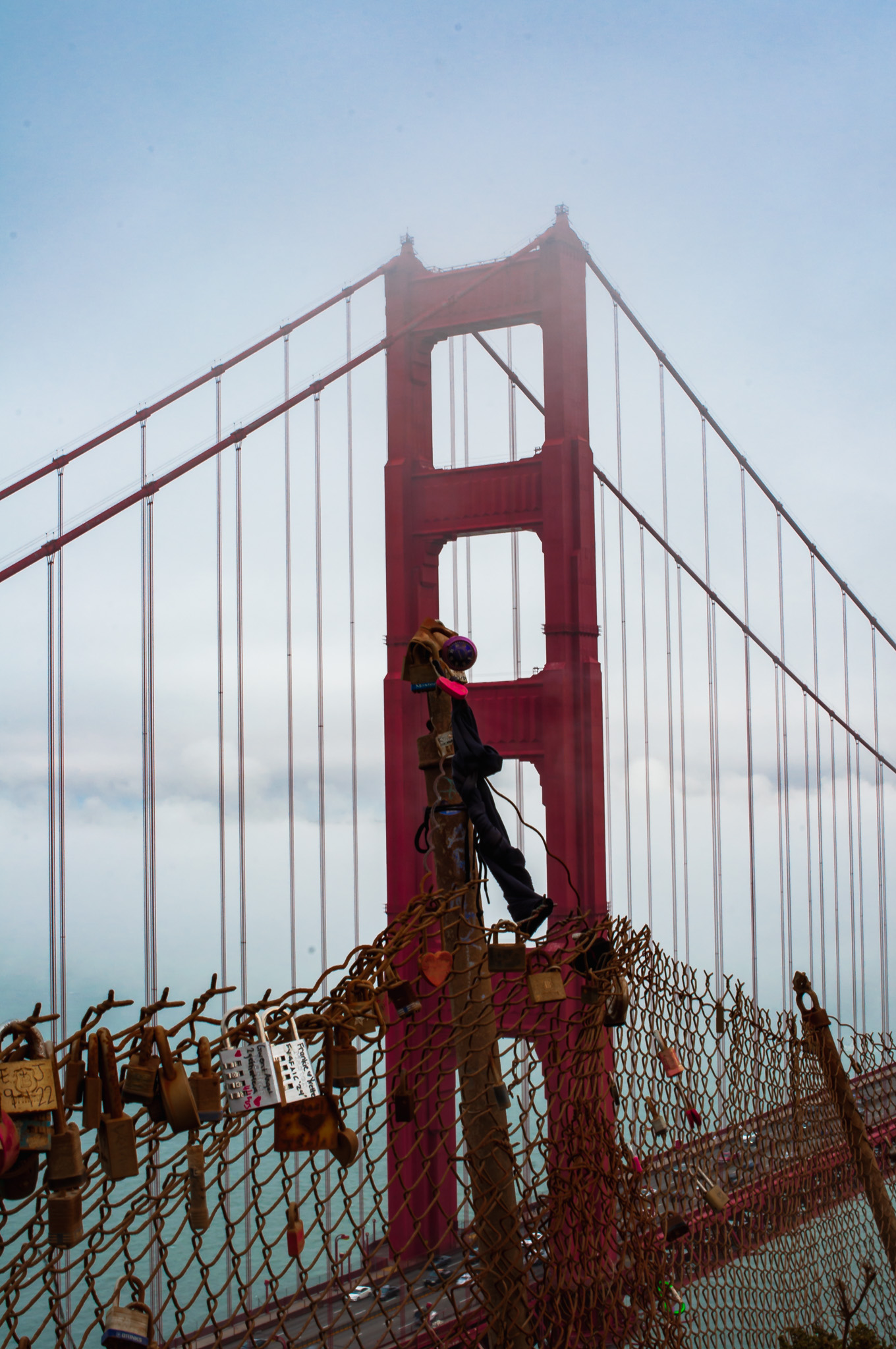 a person climbing Golden Gate Bridge