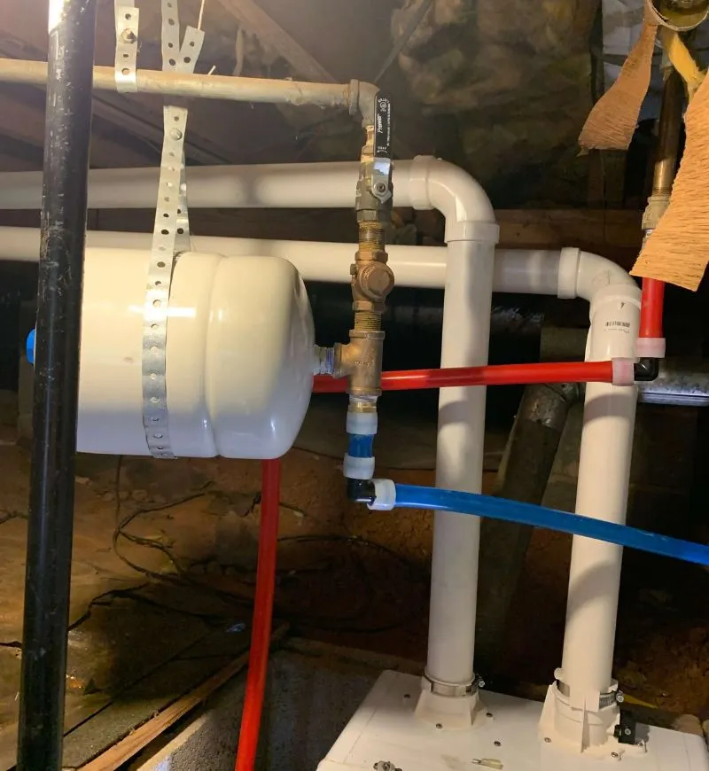 a white pipes with red and blue tubes