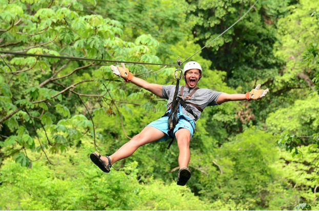 a man in a zip line