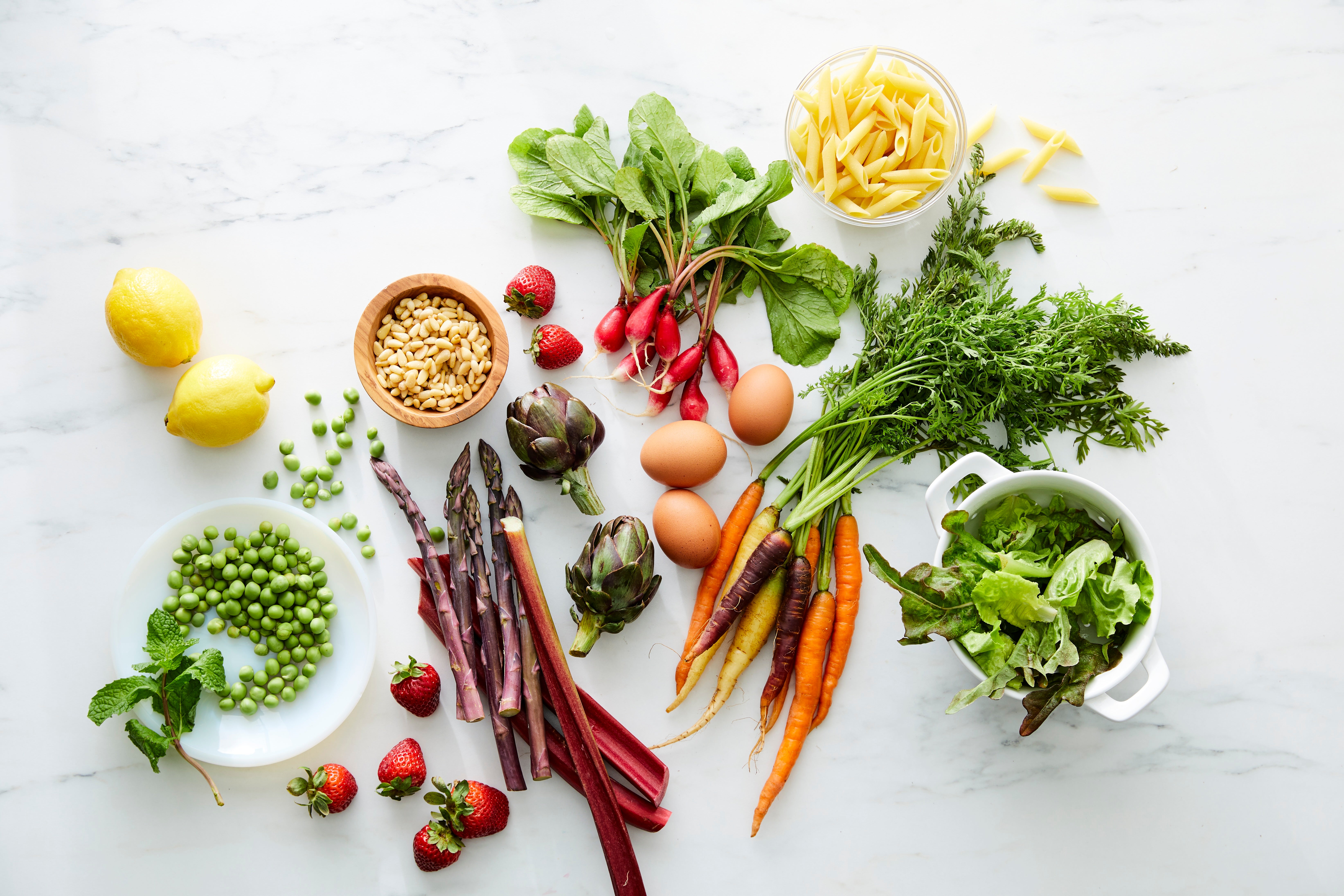 a table with different vegetables and fruits