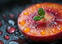 a cut fruit with a leaf on top