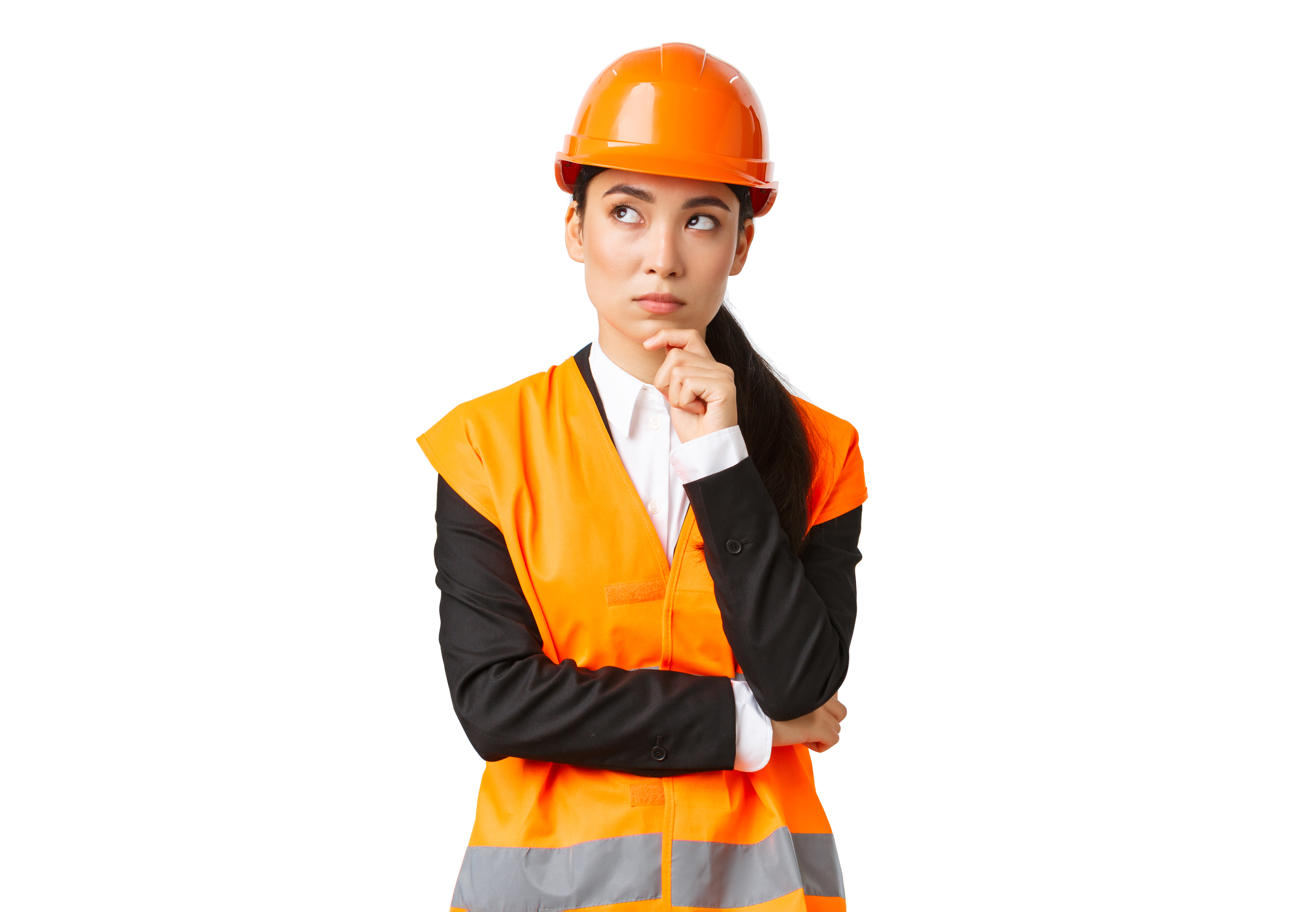 a woman in a hard hat and vest