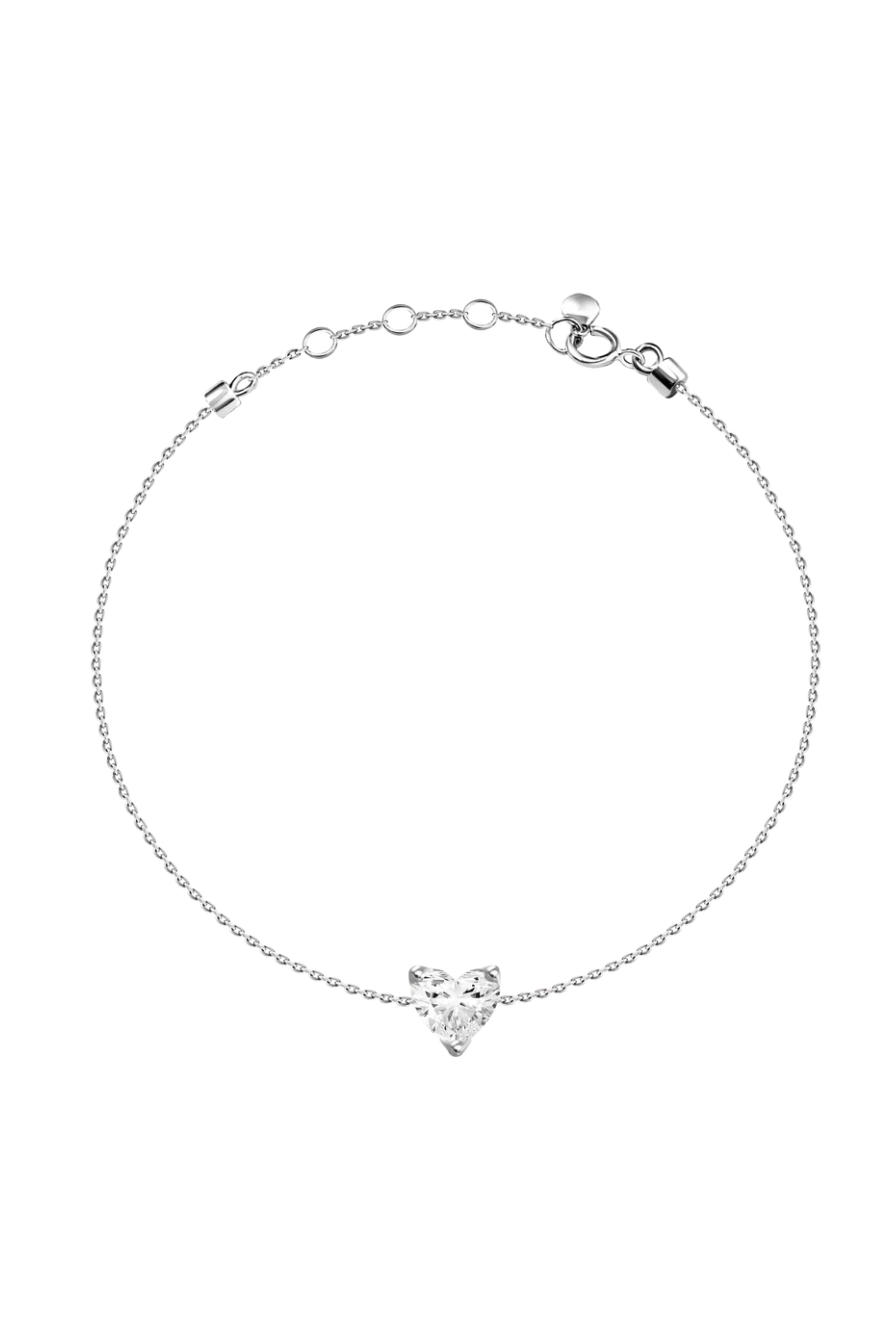 a silver bracelet with a heart shaped diamond