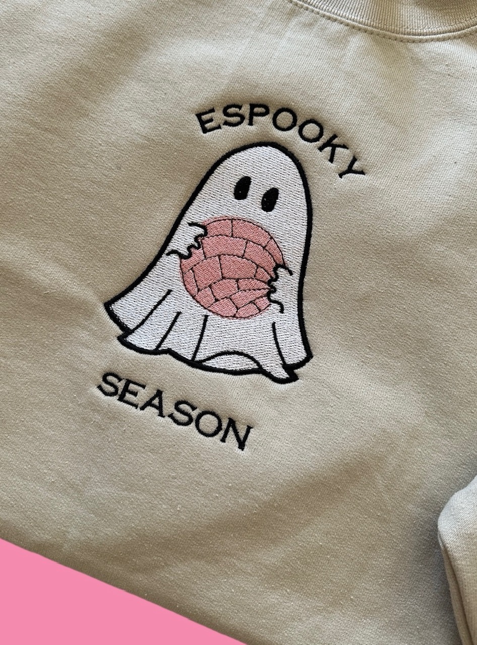 a white fabric with a cartoon ghost