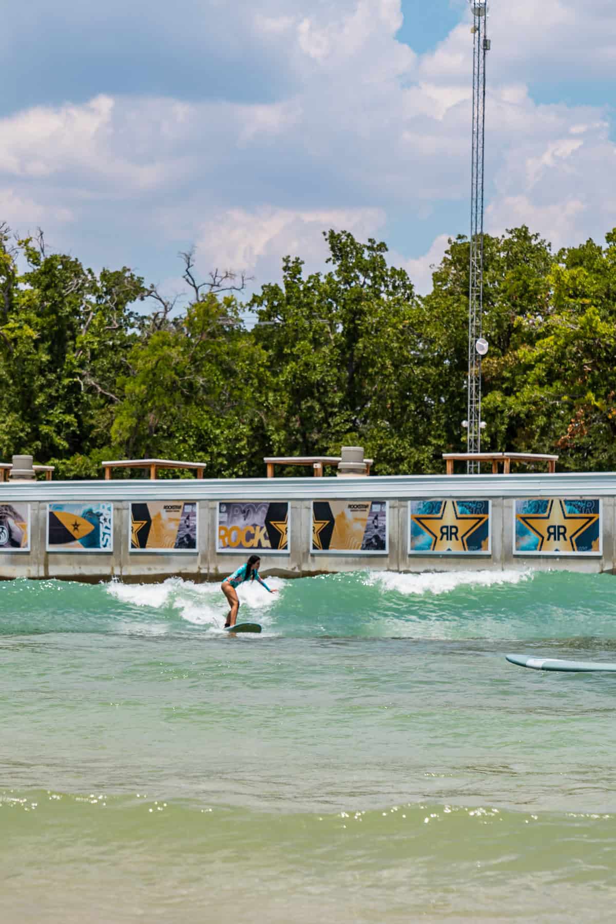 a person on a surfboard in a body of water