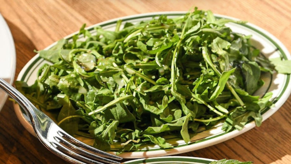 a plate of green salad