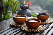 a group of brown cups on a table