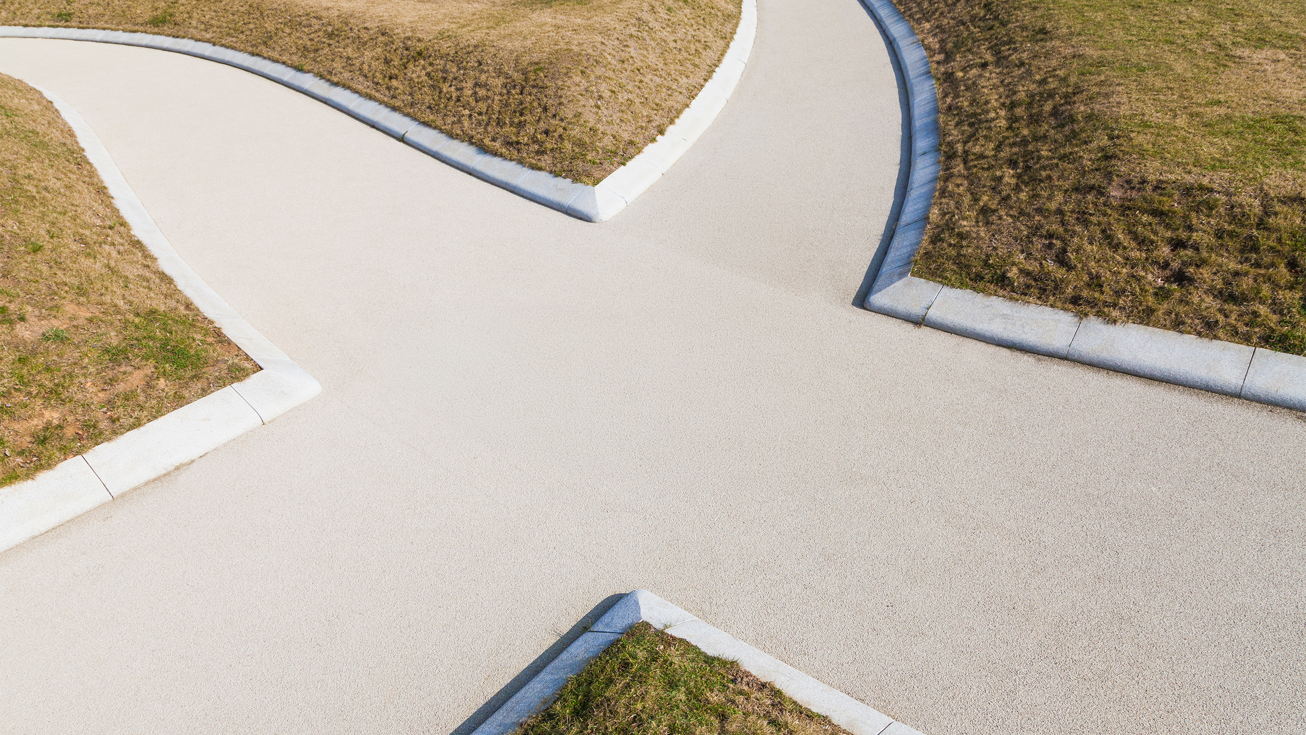 a path with grass around it