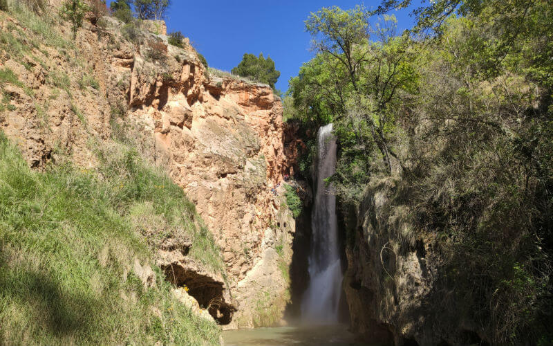 a waterfall in a rocky area