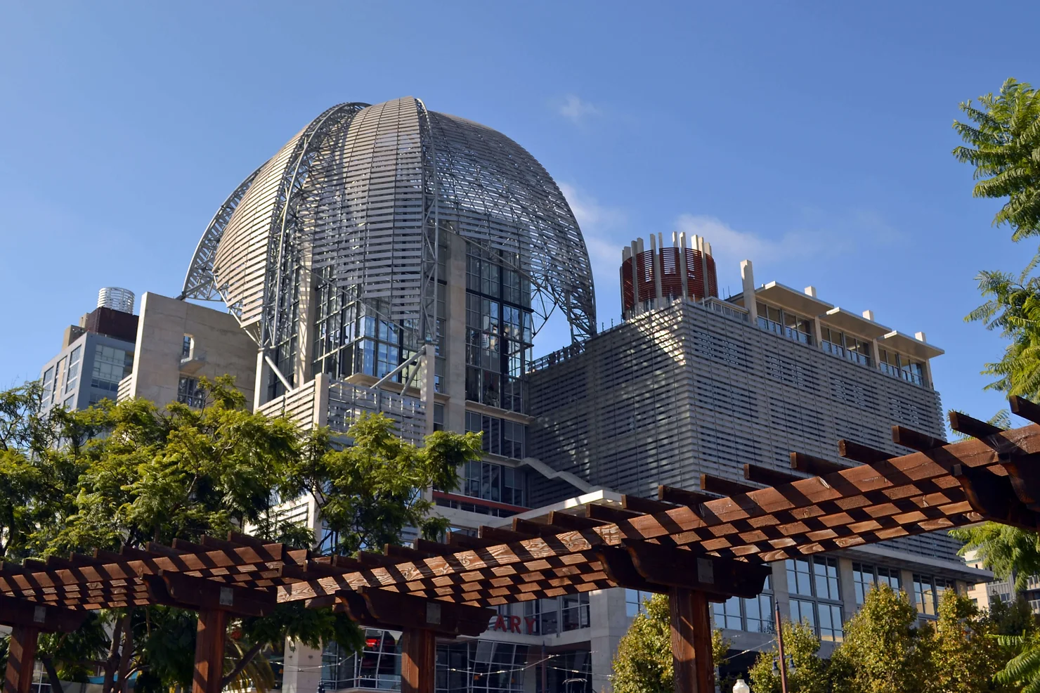 a building under construction with a pergola