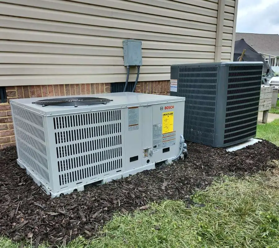 a large air conditioning unit next to a house